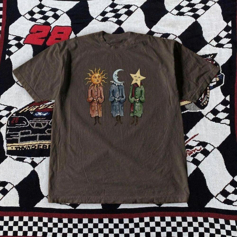 Brown Graphic Tee With Unique Sun Moon And Star Design